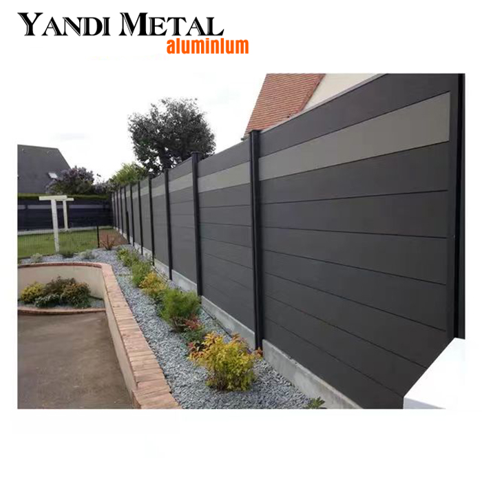 The outdoor farmhouse courtyard uses a Wpc fence grid prefabricated plastic wood composite privacy garden modular fence panel system